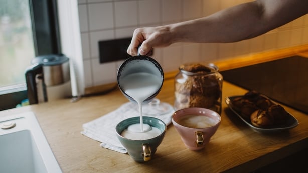 Man's hand makes coffee at home