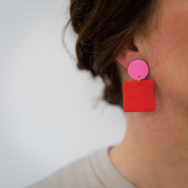 red and pink earrings
