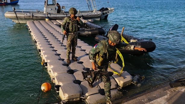 THITU ISLAND, DISPUTED SOUTH CHINA SEA - MAY 3: Philippine Marine soldiers return to the coast after patrolling, on Manila-ruled Thitu Island, in the disputed South China Sea, on May 3, 2026. The Philippine-ruled Thitu Island, also known as Pagasa, is part of the Spratly Island groups in the South C