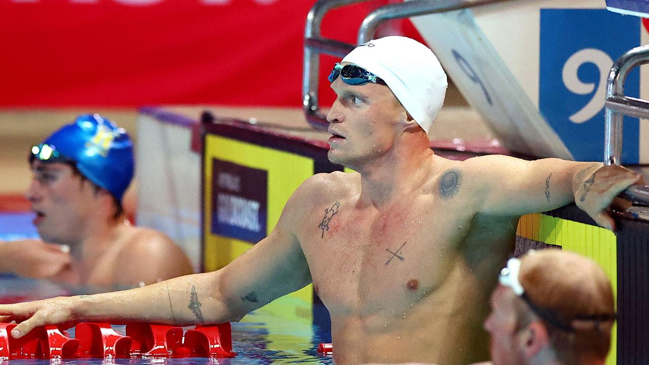 Australia's Cody Simpson looks at his time after the butterfly on Wednesday night.
