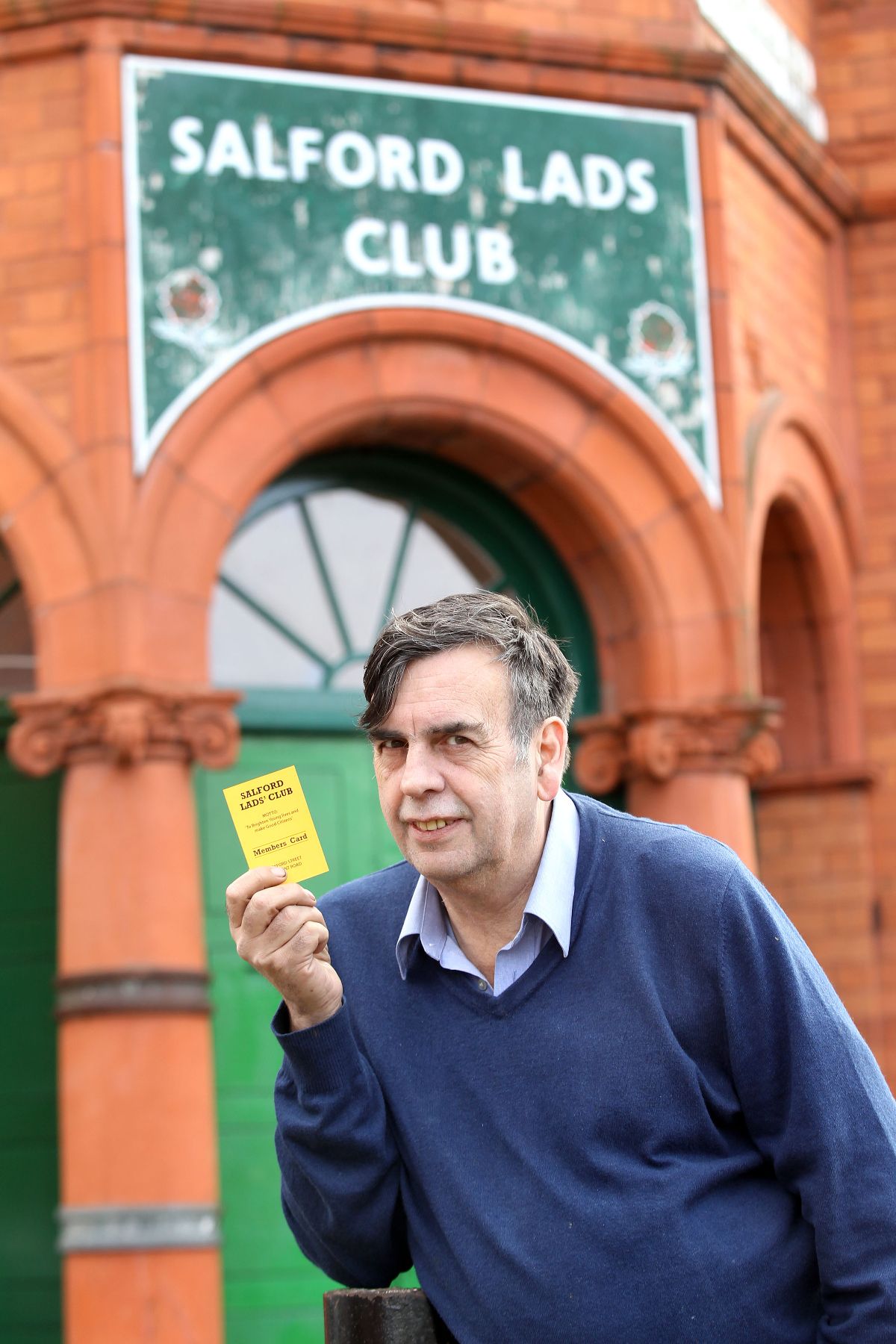 Photographer Stephen Wright with his Honourary Member of Salford Lads Club card 