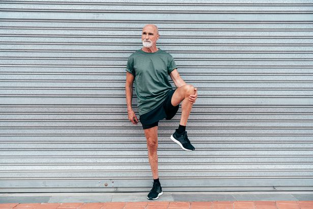 Man standing on one leg