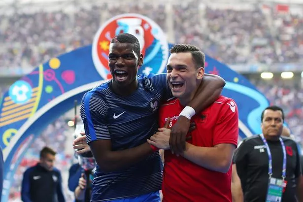 Paul Pogba of France and Frederic Veseli of Albania