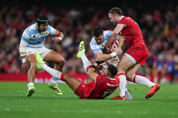 Mateo Carreras of Argentina is tackled by Max Llewellyn of Wales and Ben Thomas