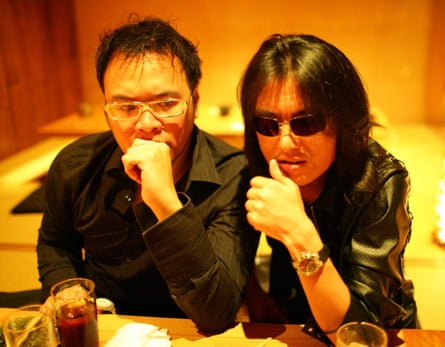 Tomonobu Itagaki, game designer, right, with James Meikle