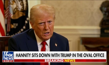 A man speaks on Fox news with a chyron that says “Hannity sits down with Trump in the Oval Office”