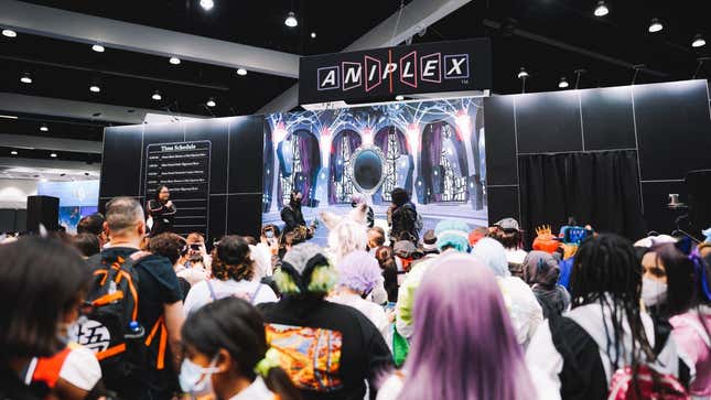 A photo shows fans attending an Aniplex panel at Anime Expo.