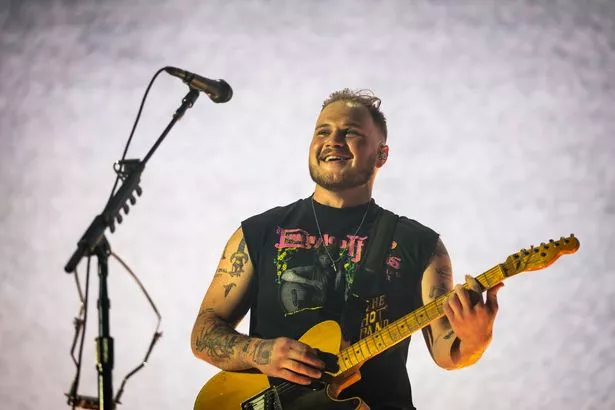 Zach Bryan performs during the Quittin Time tour