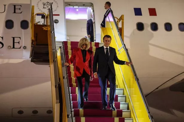 France's President Emmanuel Macron and his wife Brigitte Macron