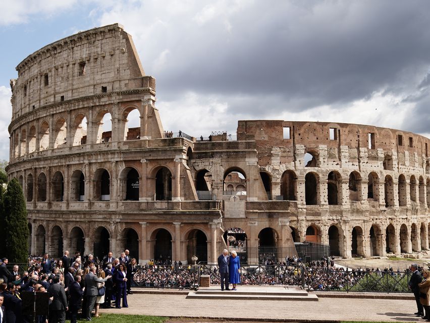 The King and Queen visit the Colosseum in Rome (Aaron Chown/PA)