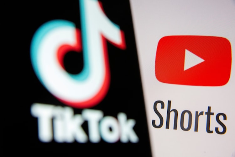 An illustartion with the Tik Tok logo and Youtube Shorts logo. (Photo: Reuters)
