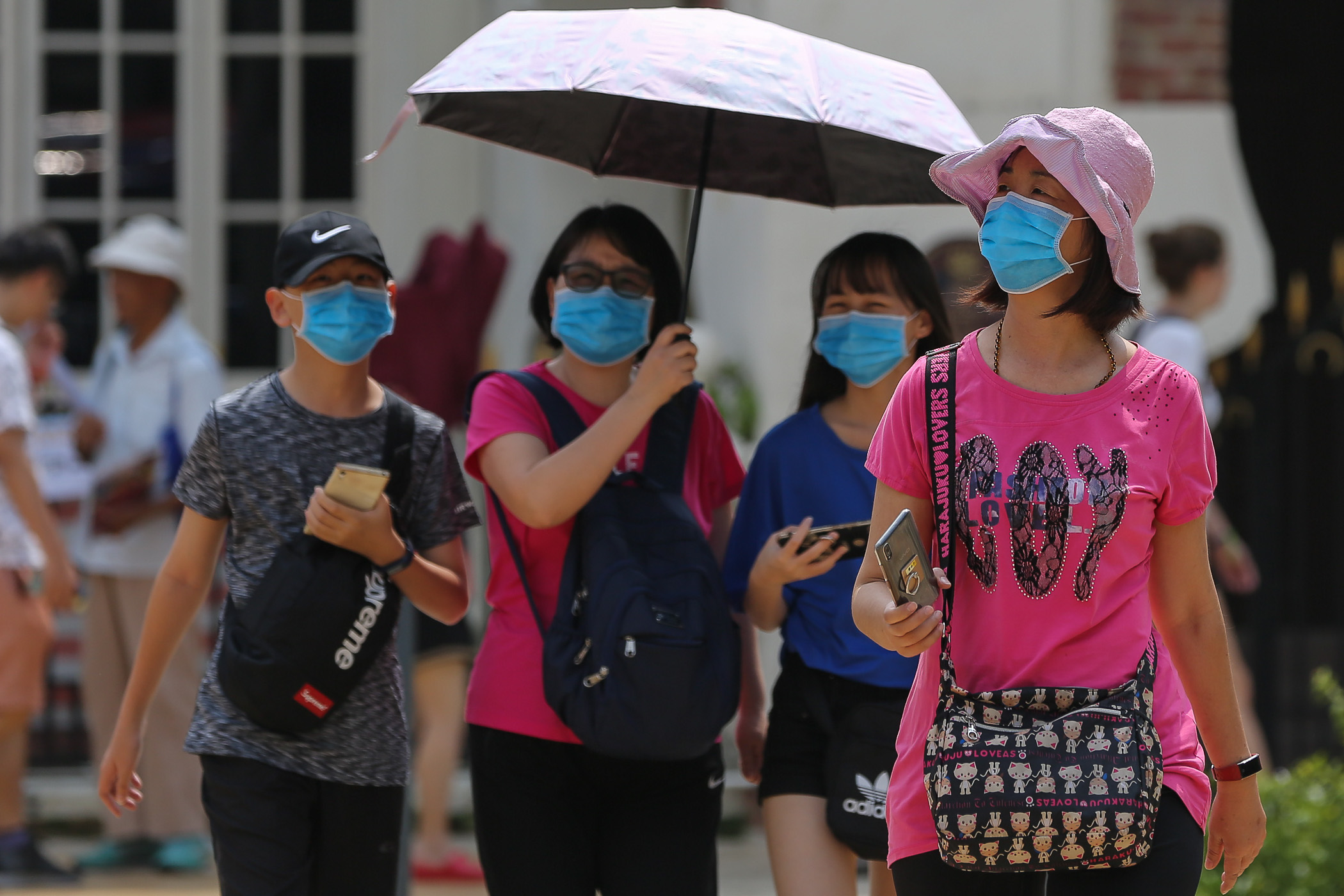 Chinese tourists wearing protective face masks are seen at the Dataran Merdeka in Kuala Lumpur January 28, 2020. — Picture by Yusof Mat Isa Chinese tourists wearing protective face masks are seen at the Dataran Merdeka in Kuala Lumpur January 28, 2020. — Picture by Yusof Mat Isa