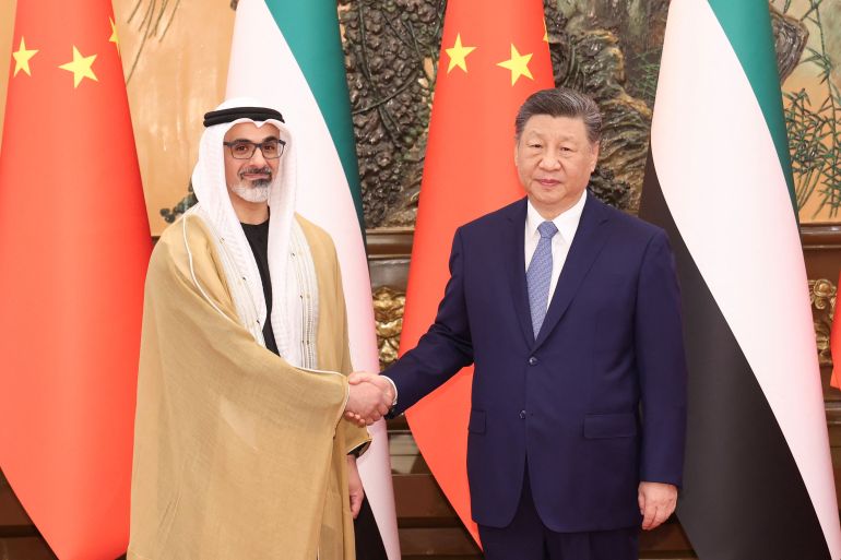 China's President Xi Jinping shakes hands with Sheikh Khaled bin Mohamed bin Zayed Al Nahyan, Crown Prince of Abu Dhabi, United Arab Emirates, in Beijing, China, April 14, 2026. cnsphoto via REUTERS ATTENTION EDITORS - THIS IMAGE WAS PROVIDED BY A THIRD PARTY. CHINA OUT. NO COMMERCIAL OR EDITORIAL SALES IN CHINA
