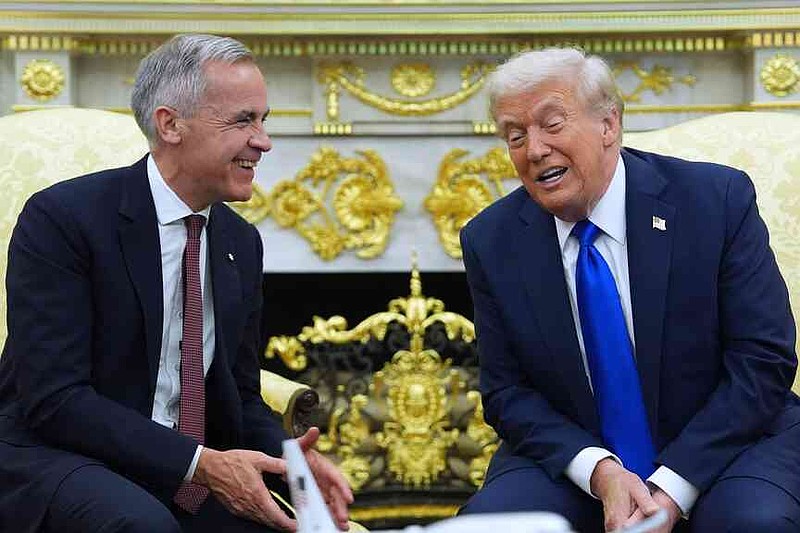 President Donald Trump and Canadian Prime Minister Mark Carney meet in the Oval Office of the White House, Tuesday, Oct. 7, 2025, in Washington. (AP Photo/Evan Vucci)