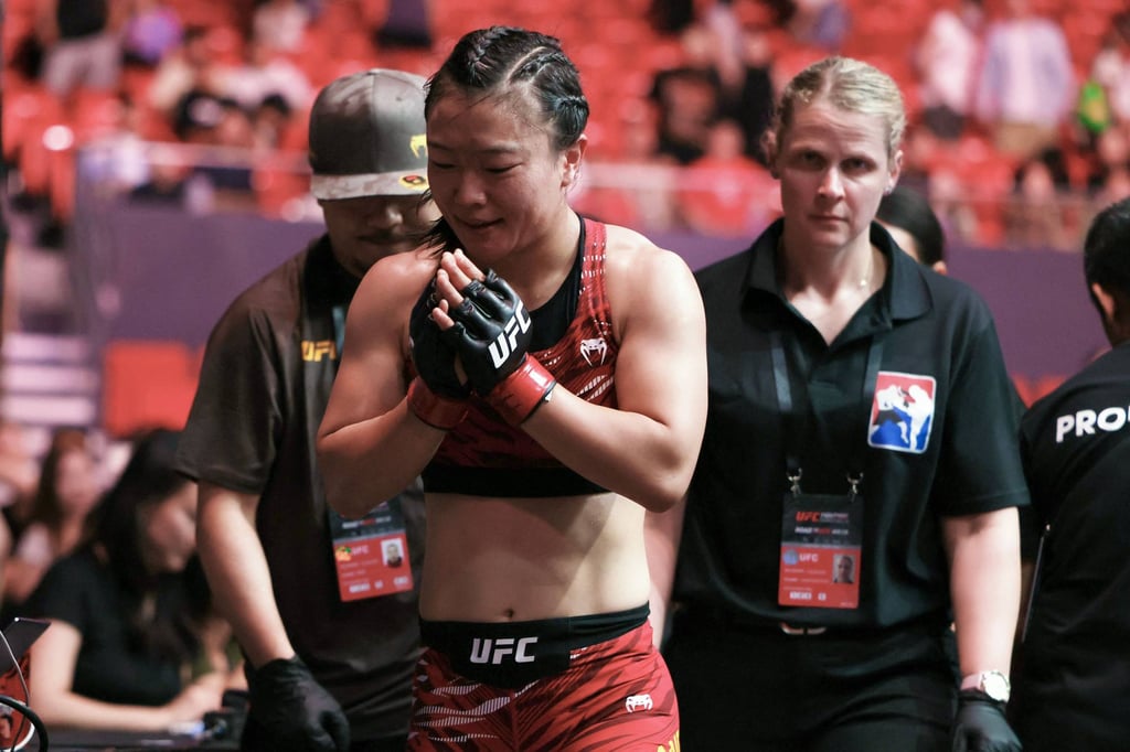 China’s Shi Ming thanks the Shanghai crowd after her fight against Bruna Brasil. Photo: AFP China’s Shi Ming thanks the Shanghai crowd after her fight against Bruna Brasil. Photo: AFP