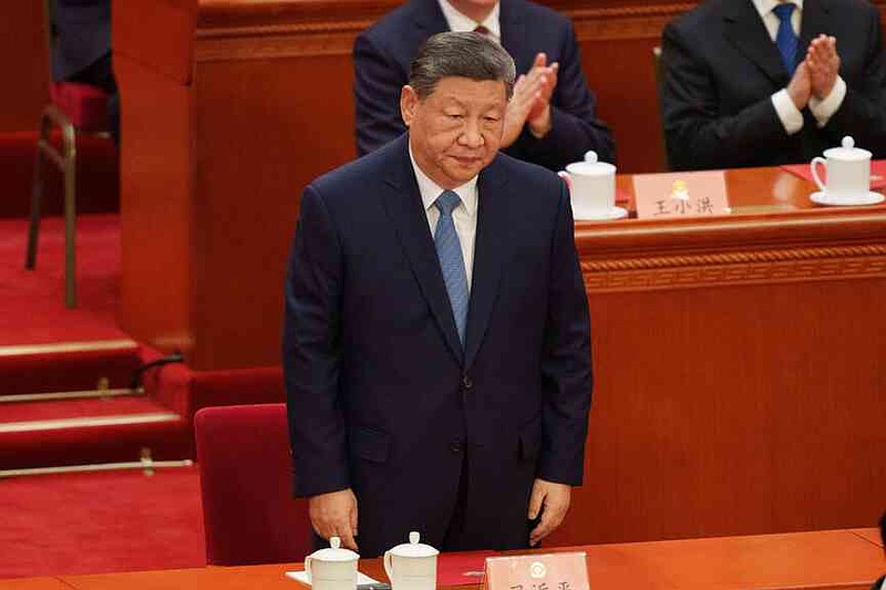 Chinese President Xi Jinping attends the closing ceremony of the Chinese People's Political Consultative Conference (CPPCC) at the Great Hall of People in Beijing, China, Wednesday, March 11, 2026. (AP Photo/Vincent Thian)