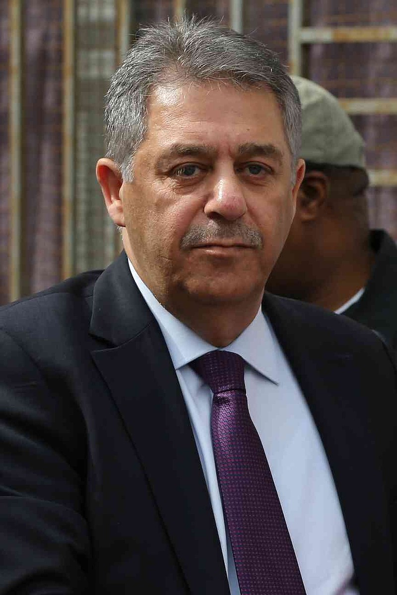 Former Palestinian Ambassador to Lebanon Ashraf Dabbour, looks on during his visit to the Palestinian refugee camp of Nahr el-Bared near the northern city of Tripoli, Lebanon, Friday, March 25, 2016. (AP Photo/Hussein Malla)