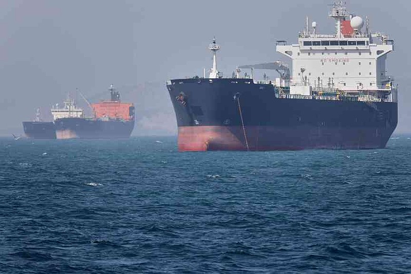 Oil tankers sit at anchor offshore in the Strait of Hormuz off Bandar Abbas, Iran, Saturday, May 2, 2026. (Amirhosein Khorgooi/ISNA via AP)