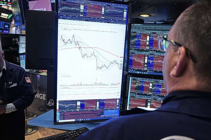 Specialist Anthony Matesic works at his post on the floor of the New York Stock Exchange, Wednesday, June 3, 2026. (AP Photo/Richard Drew)
