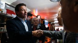 Florida Gov. Ron DeSantis greets people at the Red Arrow Diner in Manchester, New Hampshire, on May 19.