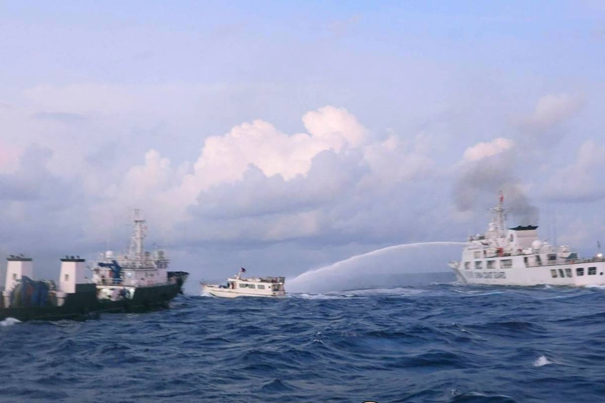 WATER-CANNONED A Chinese Coast Guard ship uses water cannons on Philippine navy-operated supply boat ML Kalayaan as it approaches Ayungin (Second Thomas) Shoal on Sunday, Dec. 10, 2023. Did our Coast Guard expect the Chinese to serve them tea and dim sum? PHILIPPINE COAST GUARD HANDOUT PHOTO VIA AP