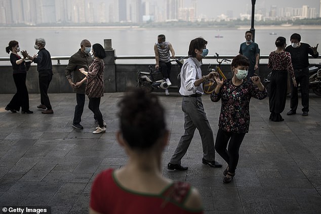 China has faced widespread criticism after authorities in the coronavirus origin city of Wuhan (pictured yesteday) reprimanded whistle-blowers who sought to raise an early alarm about the virus, prompting accusations that the cover-up may have fuelled the pandemic
