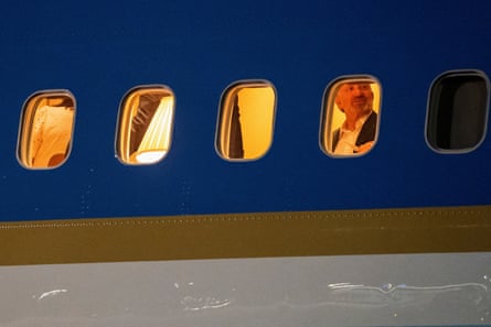 view of man through airplane window