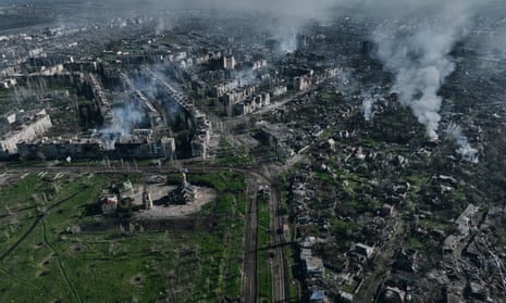 Smoke rises from buildings in this aerial view of Bakhmut, the site of the heaviest battles with the Russian troops in the Donetsk region, Ukraine, Wednesday, 26 April 2023.