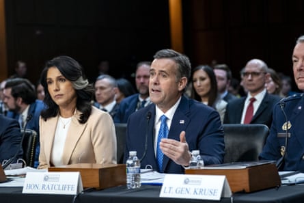 man and a woman speak at a hearing
