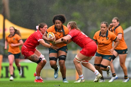 Tabua Tuinakauvadra of the Wallaroos attempts to power through the Wales defence.