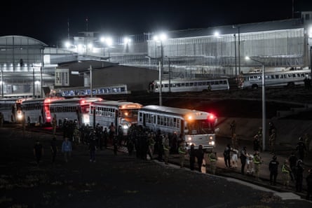 buses carrying people at night