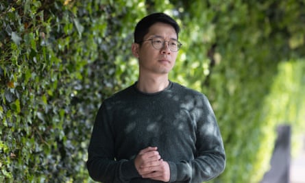 Nathan Law with greenery behind him