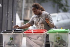 (Keystone) A woman casts her vote at a polling station in Lagos, Nigeria