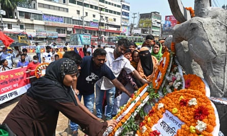 Wreaths are laid at a monument near the site of the Rana Plaza building on the ninth anniversary of the disaster.