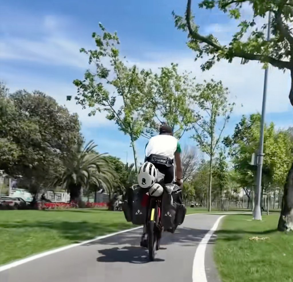Killian Le Guyader rides his fully loaded bicycle. He travelled across more than 30 countries to get to China. Photo: Douyin Killian Le Guyader rides his fully loaded bicycle. He travelled across more than 30 countries to get to China. Photo: Douyin