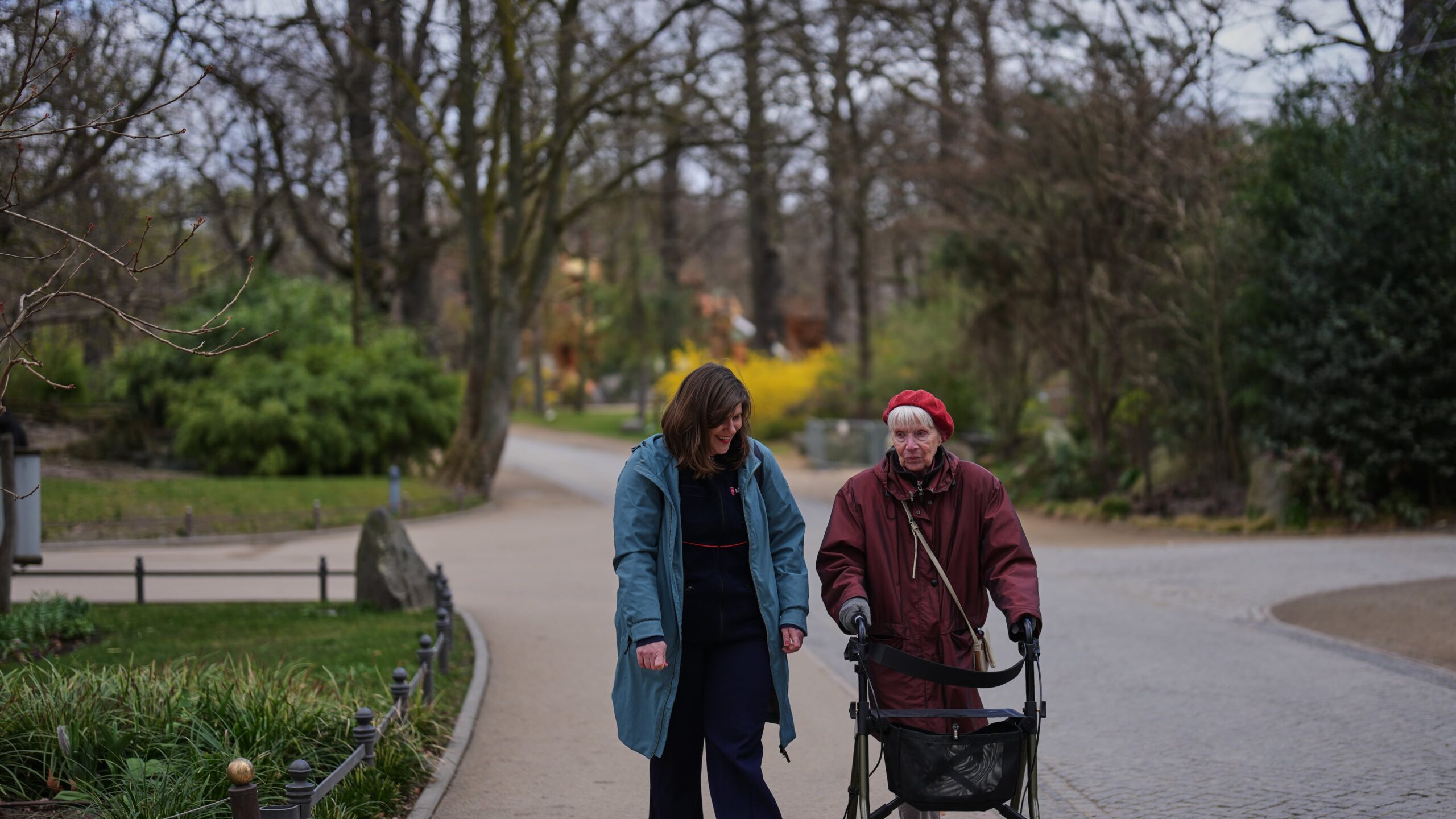 Project coordinator Christine Gruschka, left, talks to Monika Jansen, 85, during a guided tour for people with dementia organized by Malteser Deutschland, part of the international Catholic aid organization Malteser Order of Malta, at the Zoo in Berlin, Germany, Thursday, March 26, 2026. (AP Photo/Markus Schreiber)
