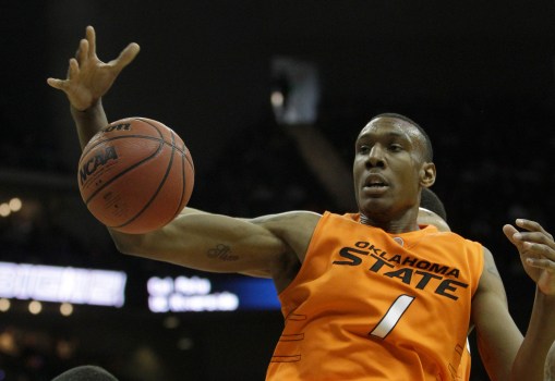 Oklahoma State center Jarred Shaw (1) (0) during the first half of an NCAA college basketball game against Kansas in the Big 12 Men's Basketball tournament Thursday, March 10, 2011 in Kansas City, Mo. (AP Photo/Charlie Riedel)