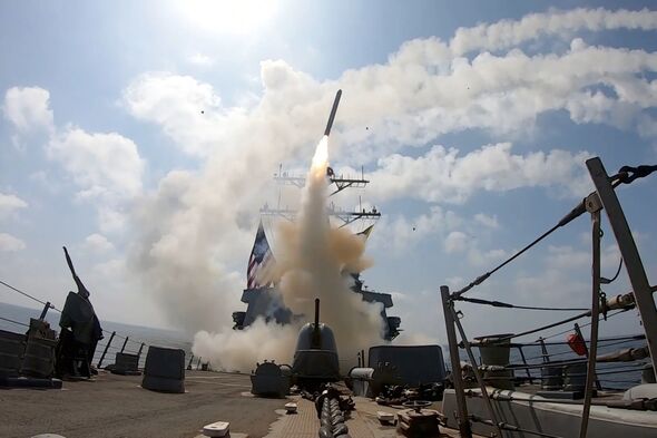 A missile is launched from an US naval vessel A missile is launched from an US naval vessel