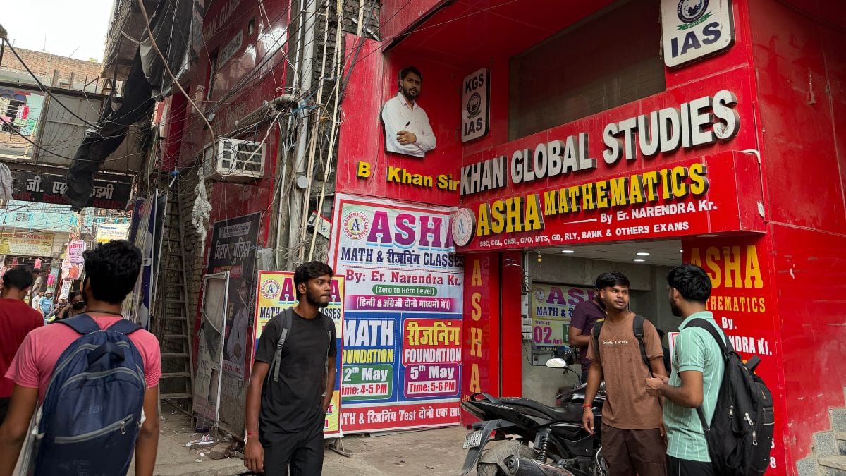 Students gather outside Khan Global Studies in Musallahpur Haat, where thousands attend classes for competitive examinations | Photo: Nootan Sharma | ThePrint
