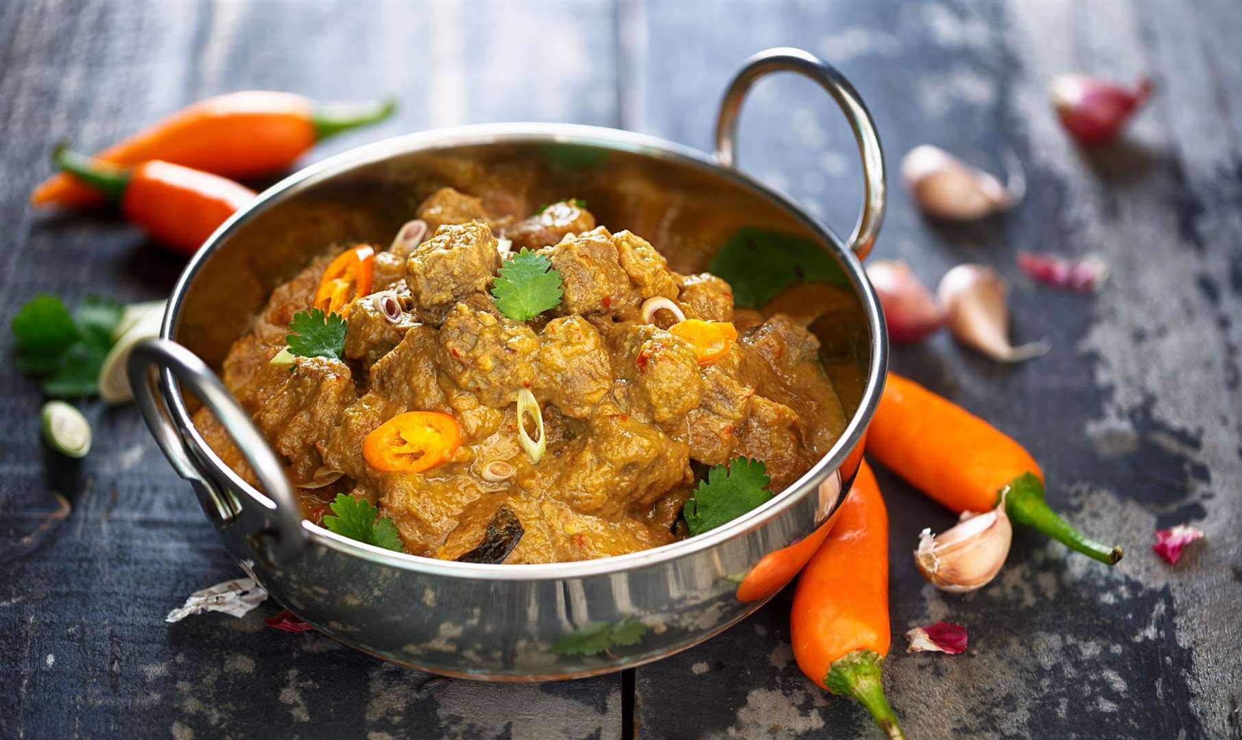 Rendang is a rich, spicy, and aromatic dry curry and a signature dish of Malaysian cuisine