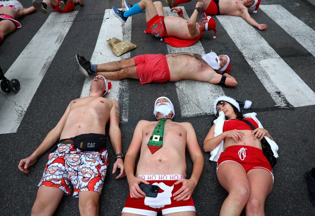 People take part in a half-naked Santa run in Budapest