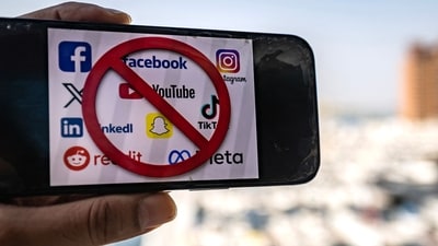 The logos of social media apps with a prohibition sign. The UAE announced a social media ban for children under 15 on June 18, joining a growing group of countries, including Australia, Britain and Canada, to take similar measures. (AFP) The logos of social media apps with a prohibition sign. The UAE announced a social media ban for children under 15 on June 18, joining a growing group of countries, including Australia, Britain and Canada, to take similar measures. (AFP)