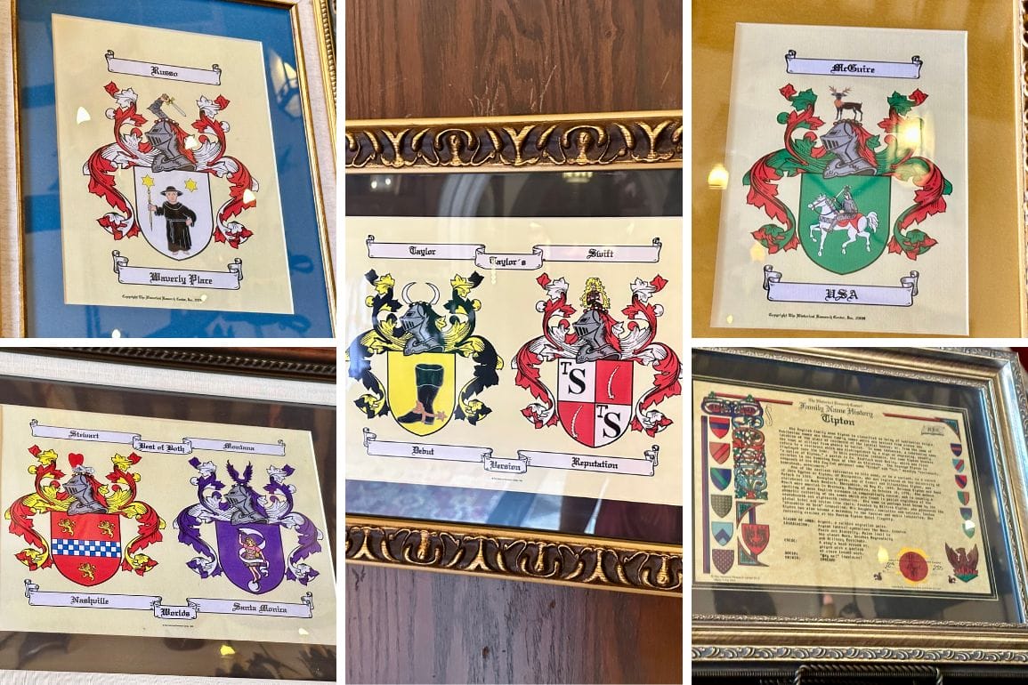 Five framed coat of arms images with colorful shields and family names, like a display at EPCOT, adorn the wall.