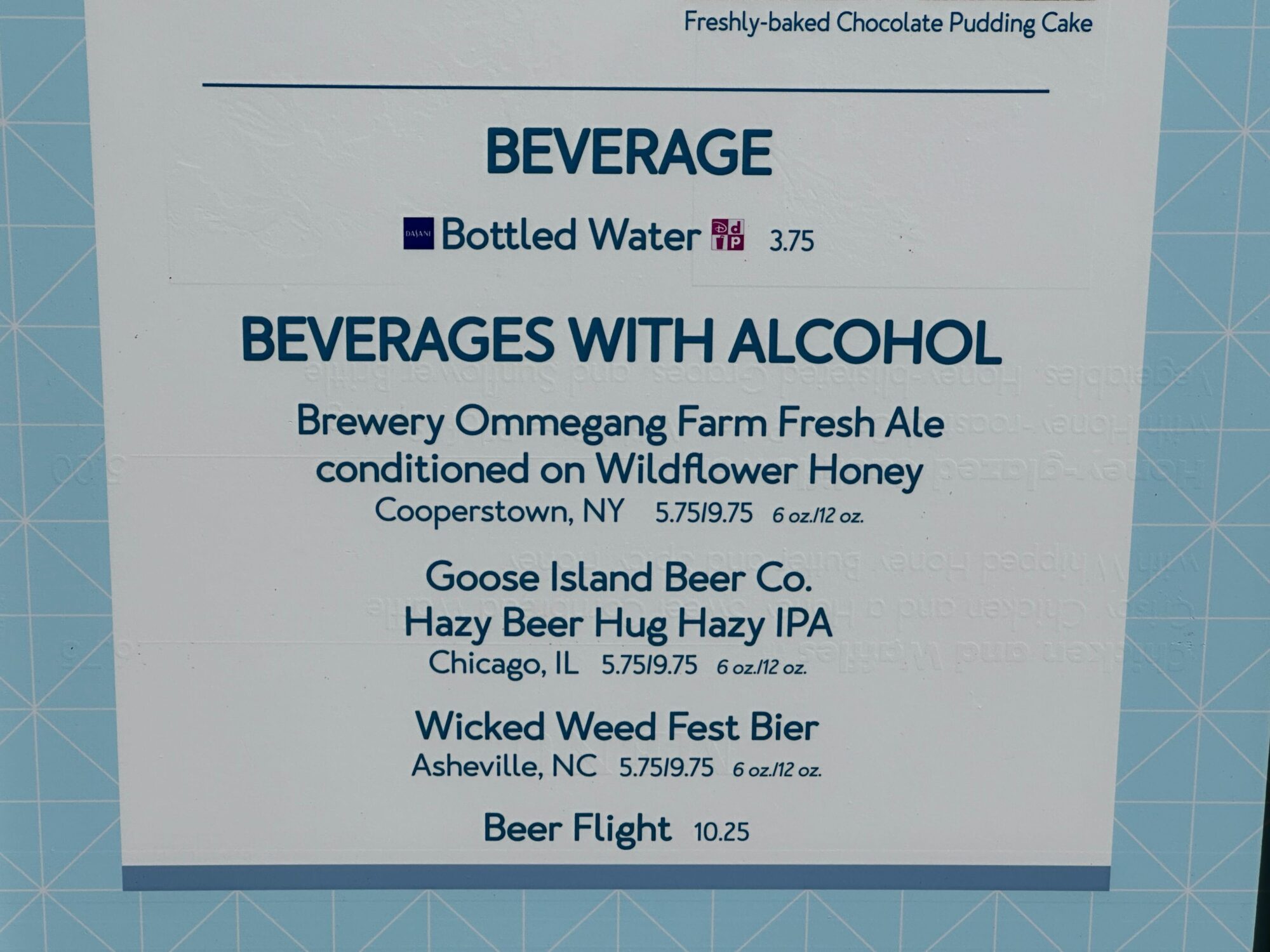 Menus (With Prices) for 2024 EPCOT International Food & Wine Festival 42 At the food & wine festival, a menu lists beverages including bottled water for $3.75, ales from Brewery Ommegang, Goose Island Beer Co., and Wicked Weed, plus beer flights for $10.25.