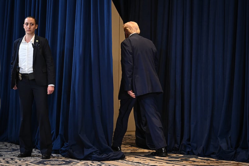 US president Donald Trump leaves after speaking to reporters at a news conference in Miami on Monday. Photograph: Roberto Schmidt/Getty Images