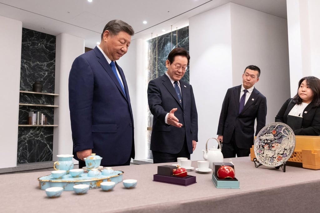 South Korea’s President Lee Jae-myung presents gifts for his Chinese counterpart Xi Jinping after their meeting in Gyeongju, South Korea, on Saturday. Photo: The Presidential Office/Yonhap/via Reuters South Korea’s President Lee Jae-myung presents gifts for his Chinese counterpart Xi Jinping after their meeting in Gyeongju, South Korea, on Saturday. Photo: The Presidential Office/Yonhap/via Reuters