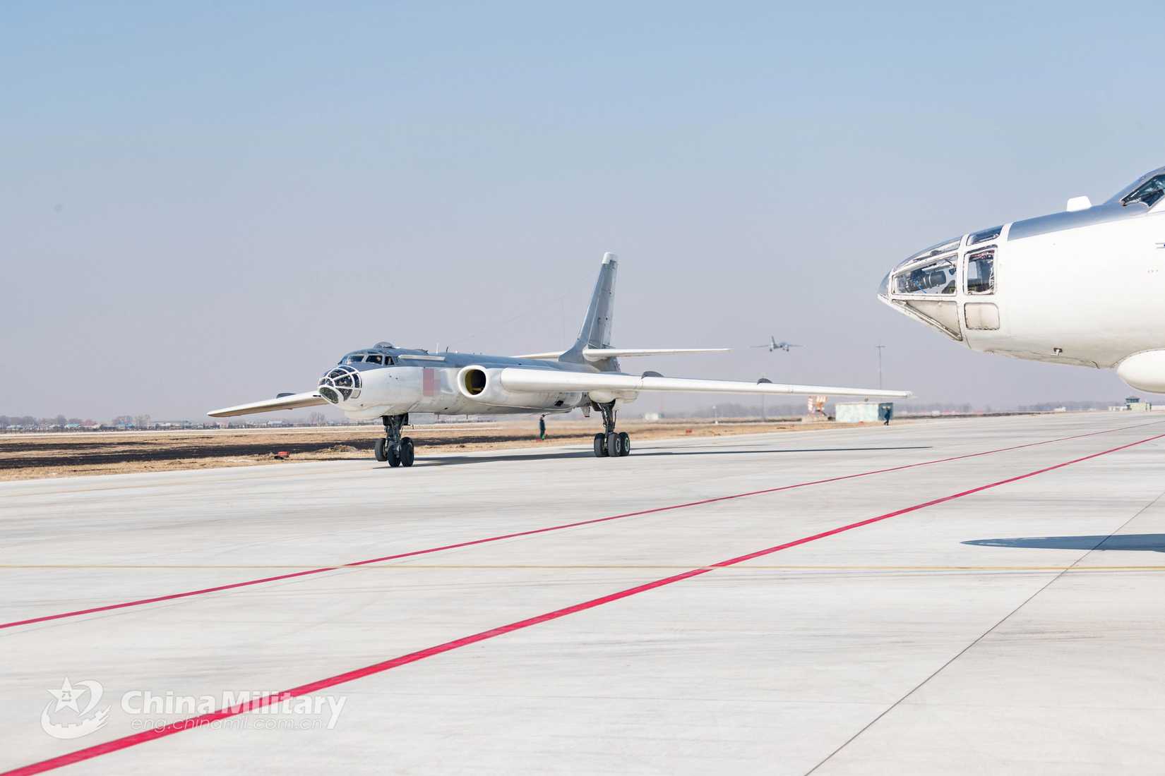 An H-6 bomber attached to a brigade with the PLA Air Force Harbin Flight Academy taxies on the runway before takeoff for a flight training exercise on March 6, 2019.