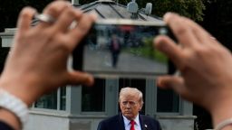 President Donald Trump walks to speak with reporters on the South Lawn as he departs the White House, on September 11, 2025.