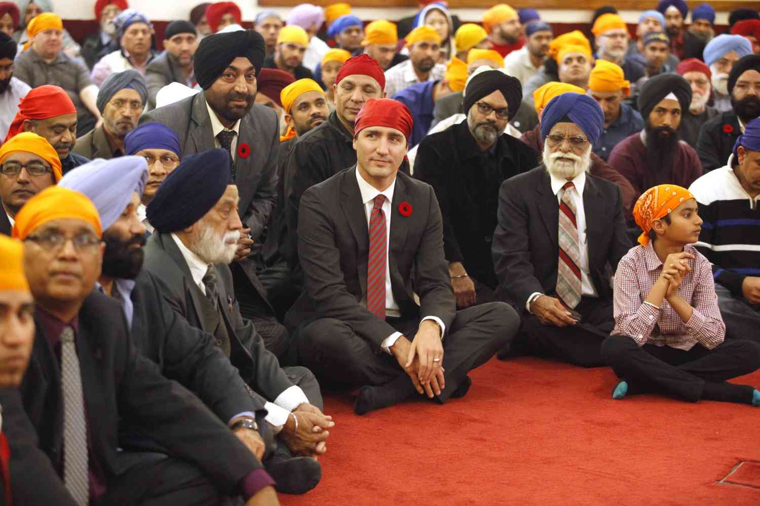 Trudeau listening to speeches at the Gurdwara Sahib Ottawa Sikh Society in Ottawa, Canada, in 2015. Credit: Patrick Doyle/Reuters