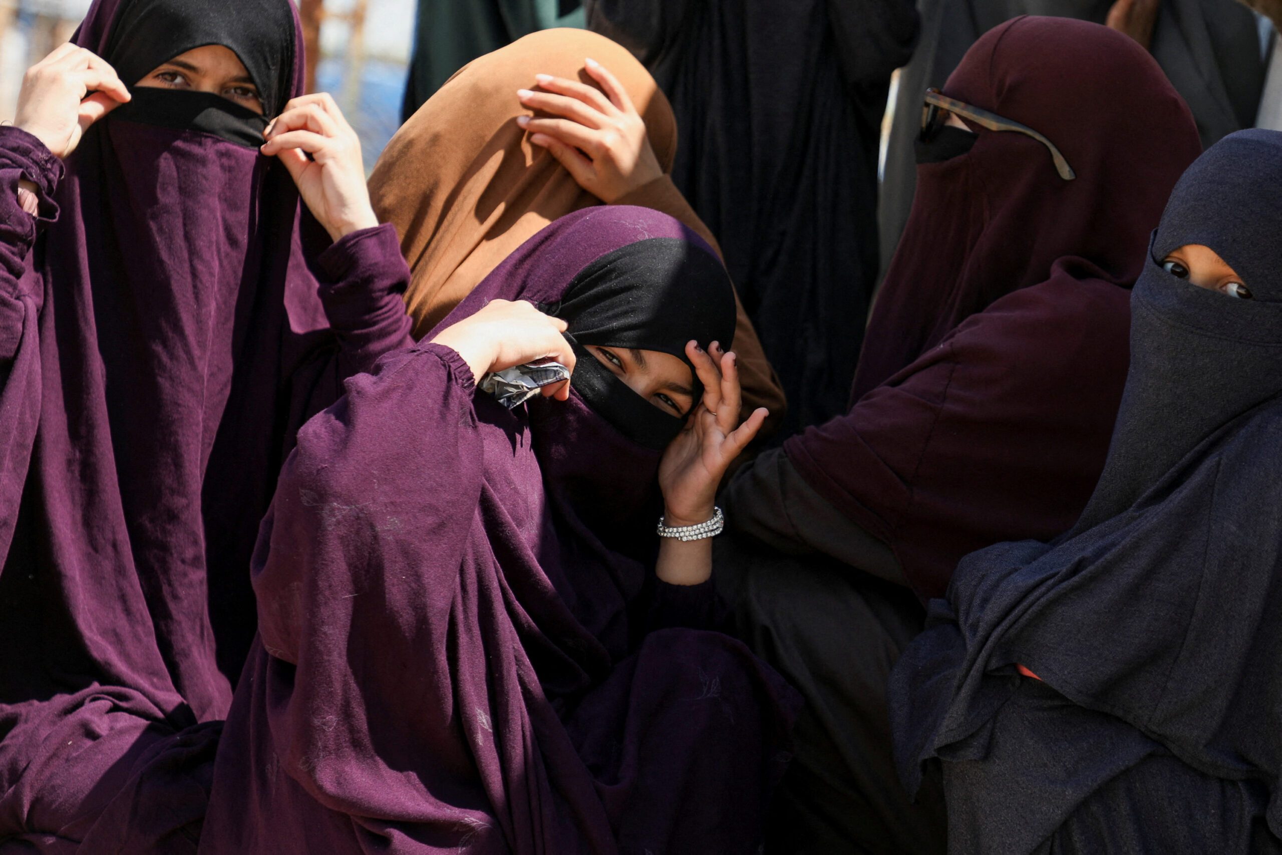 Australian families believed to be linked to the Islamic State militants leave Roj camp near Derik